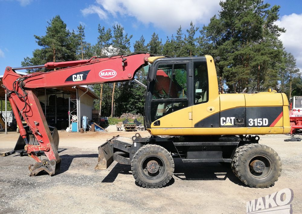 Caterpillar M315 C - מחפר גלגלים: תמונה 2 Caterpillar M315 C - מחפר גלגלים: תמונה 2