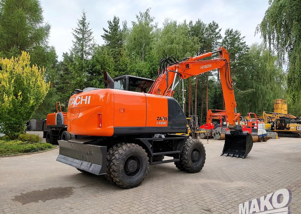 Hitachi ZX 140 - מחפר גלגלים: תמונה 4 Hitachi ZX 140 - מחפר גלגלים: תמונה 4