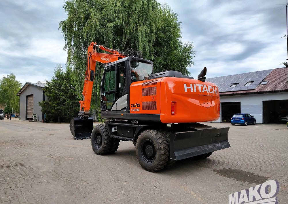 Hitachi ZX 140 - מחפר גלגלים: תמונה 2 Hitachi ZX 140 - מחפר גלגלים: תמונה 2