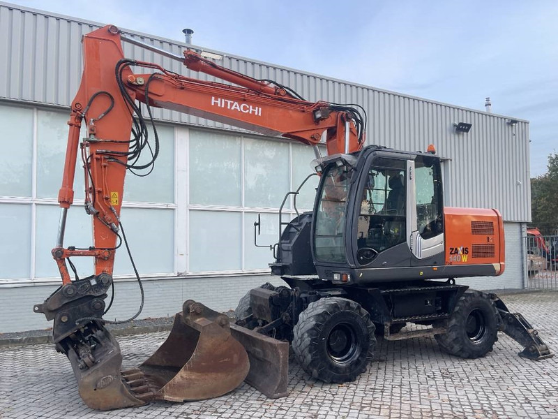 Hitachi ZX 140 W-3 - מחפר גלגלים: תמונה 1 Hitachi ZX 140 W-3 - מחפר גלגלים: תמונה 1