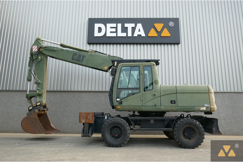 Caterpillar M318C Ex-army - מחפר גלגלים: תמונה 1 Caterpillar M318C Ex-army - מחפר גלגלים: תמונה 1