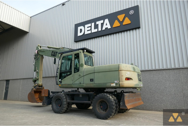 Caterpillar M318C Ex-army - מחפר גלגלים: תמונה 4 Caterpillar M318C Ex-army - מחפר גלגלים: תמונה 4