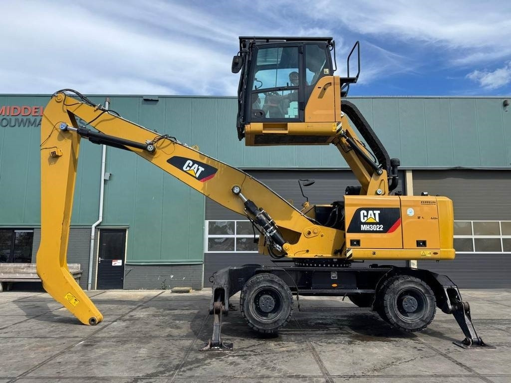 CAT MH3022 - מטפל בפסולת/ תעשייתי: תמונה 1 CAT MH3022 - מטפל בפסולת/ תעשייתי: תמונה 1