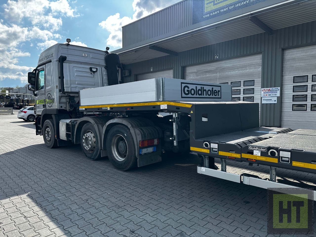 Goldhofer 4-Achs-Tele-Semi mit hydr. Doppelklapprampen - סמיטריילר עם מטען נמוך: תמונה 3 Goldhofer 4-Achs-Tele-Semi mit hydr. Doppelklapprampen - סמיטריילר עם מטען נמוך: תמונה 3