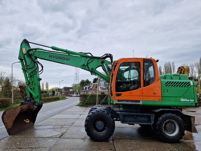 Hyundai Robex 160W-9A met 6-cilinder Cummins motor - מחפר גלגלים: תמונה 1 Hyundai Robex 160W-9A met 6-cilinder Cummins motor - מחפר גלגלים: תמונה 1