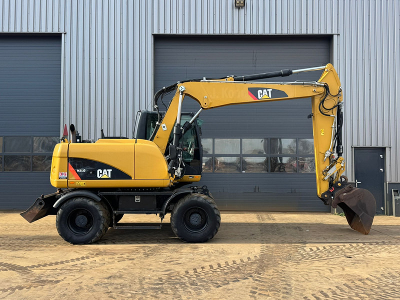 Caterpillar M313D - CE - מחפר גלגלים: תמונה 5 Caterpillar M313D - CE - מחפר גלגלים: תמונה 5