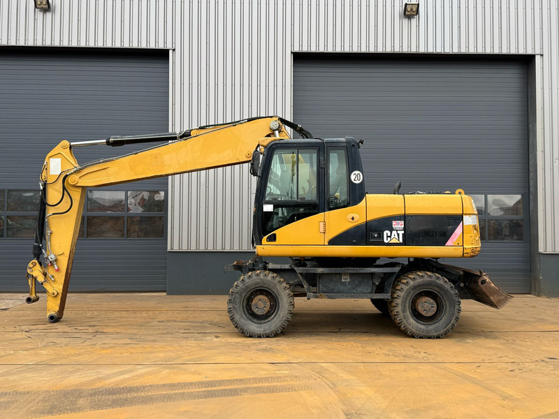Caterpillar M315D - מחפר גלגלים: תמונה 1 Caterpillar M315D - מחפר גלגלים: תמונה 1