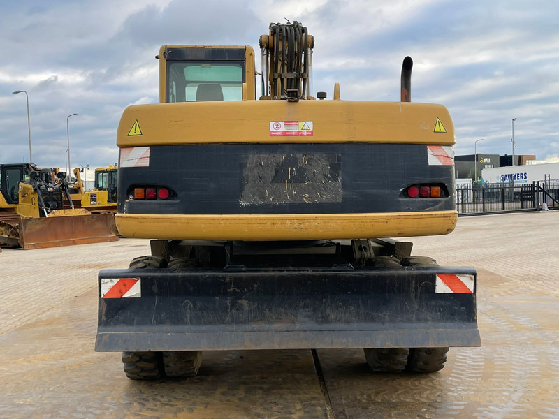 Caterpillar M318C - מחפר גלגלים: תמונה 4 Caterpillar M318C - מחפר גלגלים: תמונה 4