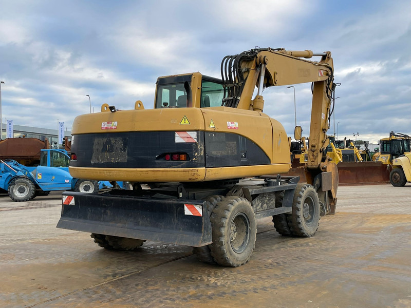 Caterpillar M318C - מחפר גלגלים: תמונה 5 Caterpillar M318C - מחפר גלגלים: תמונה 5