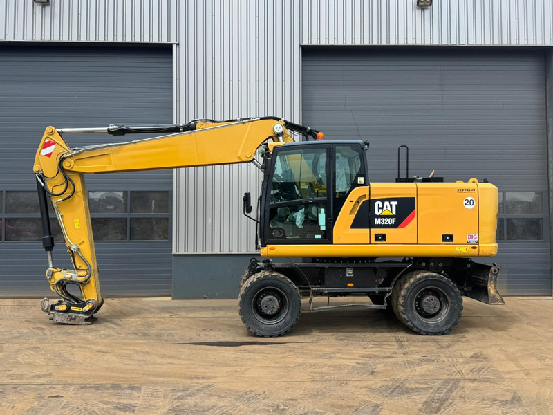 Caterpillar M320F - מחפר גלגלים: תמונה 1 Caterpillar M320F - מחפר גלגלים: תמונה 1