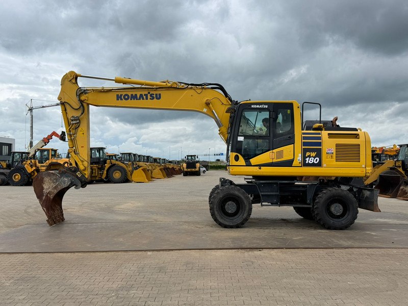 Komatsu PW180-11 - מחפר גלגלים: תמונה 1 Komatsu PW180-11 - מחפר גלגלים: תמונה 1