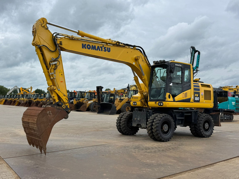 Komatsu PW180-11 - מחפר גלגלים: תמונה 2 Komatsu PW180-11 - מחפר גלגלים: תמונה 2