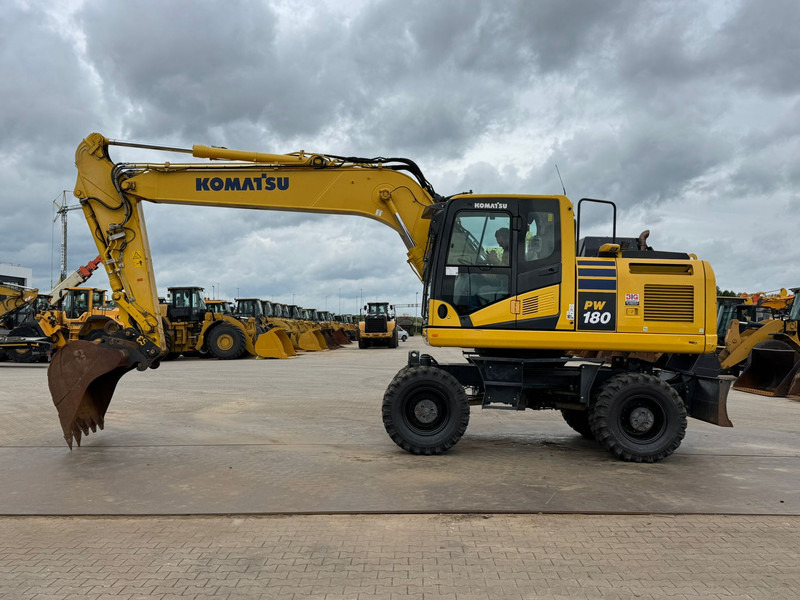 Komatsu PW180-11 - מחפר גלגלים: תמונה 1 Komatsu PW180-11 - מחפר גלגלים: תמונה 1