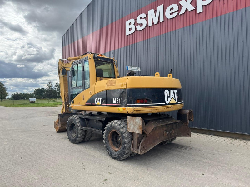 Caterpillar M 315 C - מחפר גלגלים: תמונה 4 Caterpillar M 315 C - מחפר גלגלים: תמונה 4