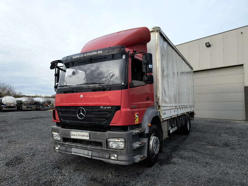 Mercedes-Benz Axor 1829 + D'HOLLANDIA 2000 KG - משאית וילונות צד: תמונה 1 Mercedes-Benz Axor 1829 + D'HOLLANDIA 2000 KG - משאית וילונות צד: תמונה 1