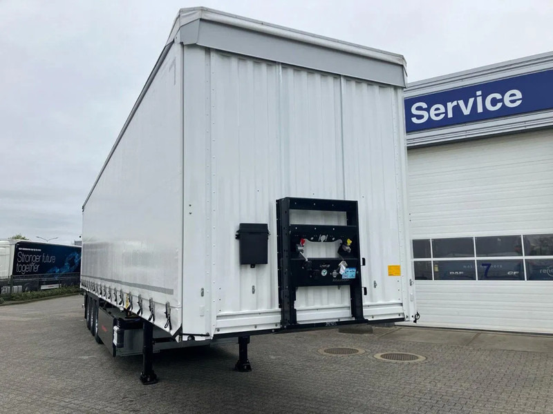 Kässbohrer SCS X+ / 90 - 12 / 27 Schuifzeilen multiplex vloer met palletkist 30 Europallets - סמיטריילר עם וילונות צד: תמונה 2 Kässbohrer SCS X+ / 90 - 12 / 27 Schuifzeilen multiplex vloer met palletkist 30 Europallets - סמיטריילר עם וילונות צד: תמונה 2