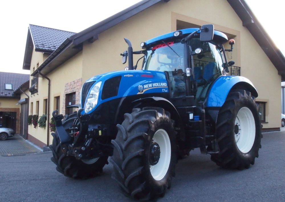 Ciągnik New Holland T7.185 2013 New Holland Autocommand i TUZ - טרקטור חקלאי: תמונה 1 Ciągnik New Holland T7.185 2013 New Holland Autocommand i TUZ - טרקטור חקלאי: תמונה 1