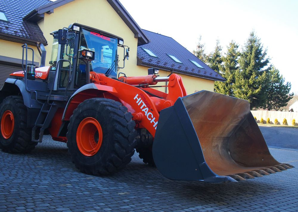 Ładowarka Hitachi ZW250 2010 Ładowarka Hitachi Waga, Centralne smarowanie - מעמיס גלגלים: תמונה 1 Ładowarka Hitachi ZW250 2010 Ładowarka Hitachi Waga, Centralne smarowanie - מעמיס גלגלים: תמונה 1