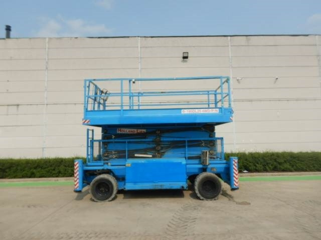 Holland Lift B-195DL25 - מעלית מספריים: תמונה 1 Holland Lift B-195DL25 - מעלית מספריים: תמונה 1