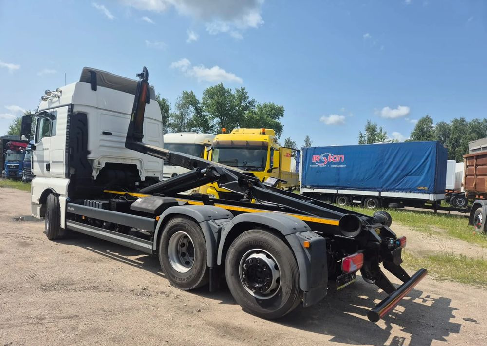 MAN TGX 26-460 Hakowiec oś skrętna - משאית הרמת וו: תמונה 1 MAN TGX 26-460 Hakowiec oś skrętna - משאית הרמת וו: תמונה 1