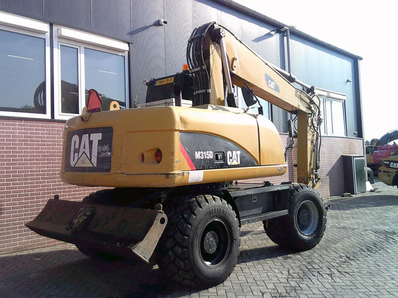 Caterpillar M315D - מחפר גלגלים: תמונה 3 Caterpillar M315D - מחפר גלגלים: תמונה 3