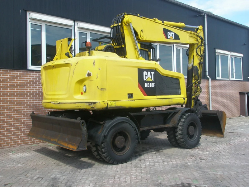 Caterpillar M318F - מחפר גלגלים: תמונה 3 Caterpillar M318F - מחפר גלגלים: תמונה 3
