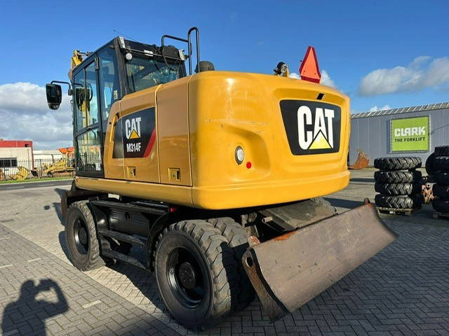 Caterpillar M314F - מחפר גלגלים: תמונה 2 Caterpillar M314F - מחפר גלגלים: תמונה 2