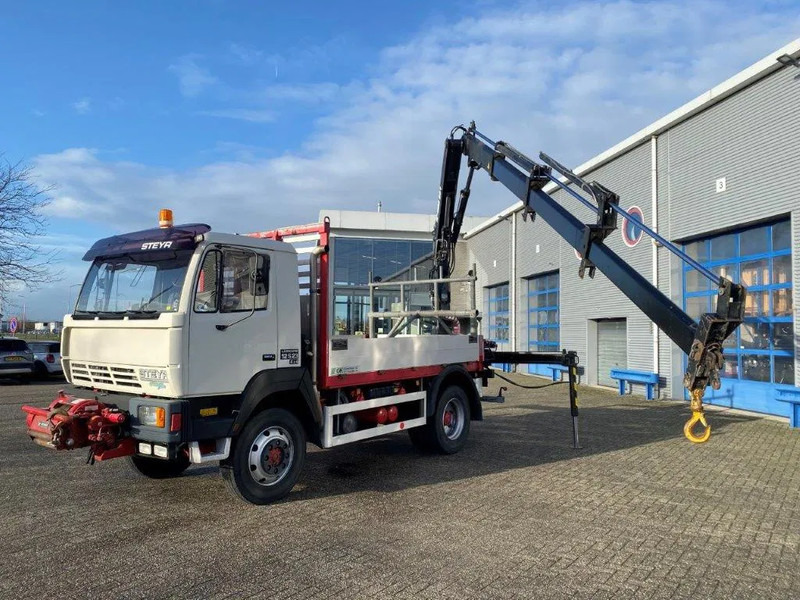 Steyr LÄRMARM 12S23 / 4X4 / CRANE HIAB 092 / WINCH / ONLY: 117406KM / TOP CONDITION / BIG AXLE / FULL STEEL+DRUM BRAKES / MANUAL / EUR - משאית מנוף: תמונה 1 Steyr LÄRMARM 12S23 / 4X4 / CRANE HIAB 092 / WINCH / ONLY: 117406KM / TOP CONDITION / BIG AXLE / FULL STEEL+DRUM BRAKES / MANUAL / EUR - משאית מנוף: תמונה 1