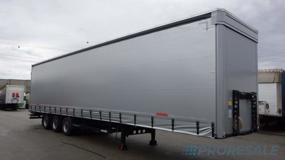 KÖGEL SN 24 MEGA - סמיטריילר עם וילונות צד: תמונה 1 KÖGEL SN 24 MEGA - סמיטריילר עם וילונות צד: תמונה 1