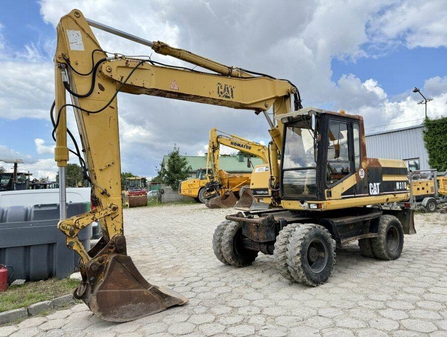 CAT M318 - מחפר גלגלים: תמונה 2 CAT M318 - מחפר גלגלים: תמונה 2