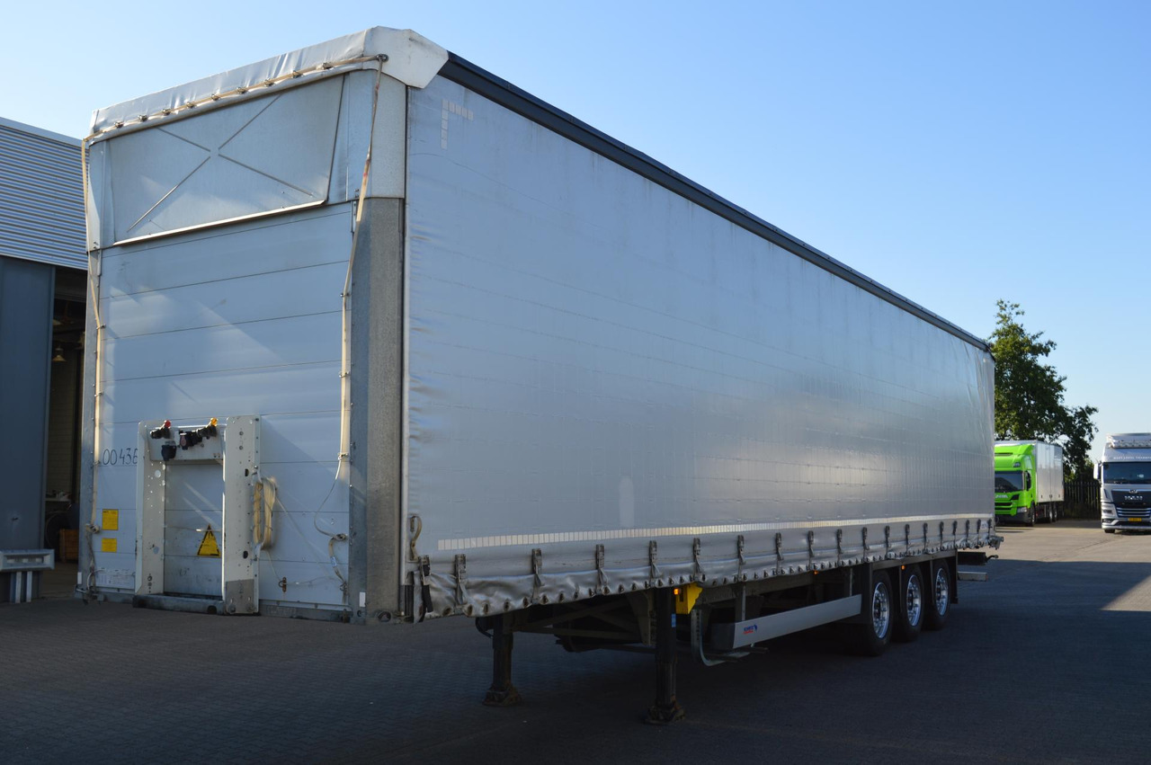 Schmitz Cargobull SCS24/L Varios - סמיטריילר עם וילונות צד: תמונה 1 Schmitz Cargobull SCS24/L Varios - סמיטריילר עם וילונות צד: תמונה 1