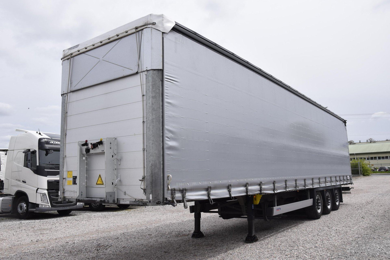 Schmitz Cargobull SCS24/L Varios - סמיטריילר עם וילונות צד: תמונה 1 Schmitz Cargobull SCS24/L Varios - סמיטריילר עם וילונות צד: תמונה 1