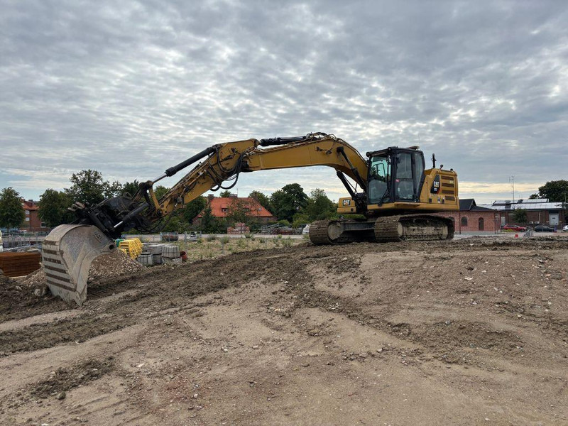 Caterpillar 323 - מחפר סורק: תמונה 1 Caterpillar 323 - מחפר סורק: תמונה 1