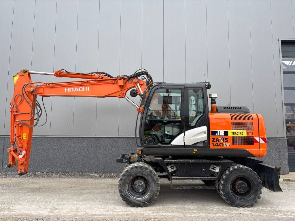 Hitachi ZX 140 W-5B - מחפר גלגלים: תמונה 1 Hitachi ZX 140 W-5B - מחפר גלגלים: תמונה 1