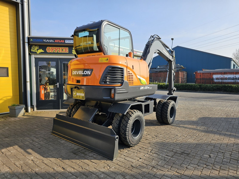Develon DX60WN ECO-1 - מחפר גלגלים: תמונה 4 Develon DX60WN ECO-1 - מחפר גלגלים: תמונה 4