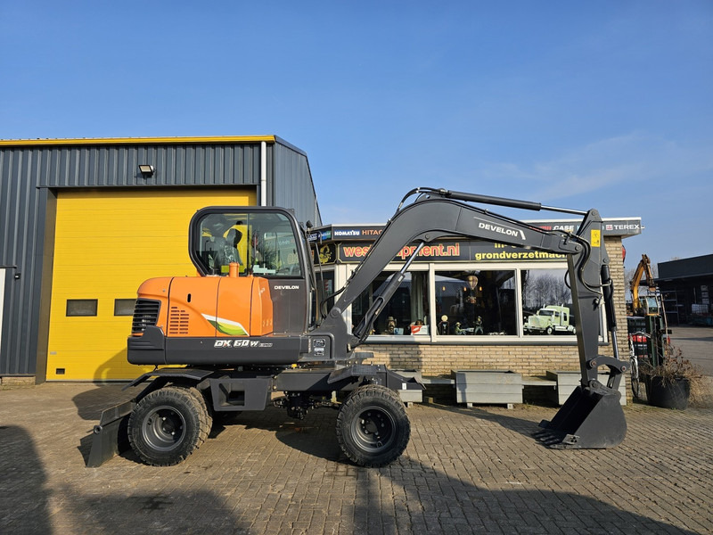 Develon DX60WN ECO-1 - מחפר גלגלים: תמונה 5 Develon DX60WN ECO-1 - מחפר גלגלים: תמונה 5