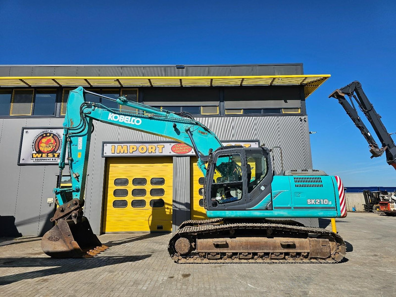 Kobelco SK210LC-9 - מחפר סורק: תמונה 1 Kobelco SK210LC-9 - מחפר סורק: תמונה 1