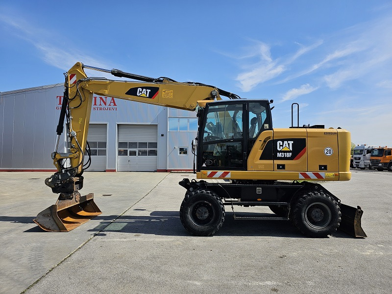 CATERPILLAR M318F - מחפר גלגלים: תמונה 2 CATERPILLAR M318F - מחפר גלגלים: תמונה 2