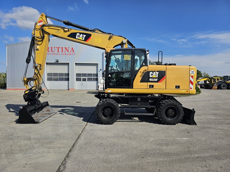 CATERPILLAR M320F - מחפר גלגלים: תמונה 1 CATERPILLAR M320F - מחפר גלגלים: תמונה 1