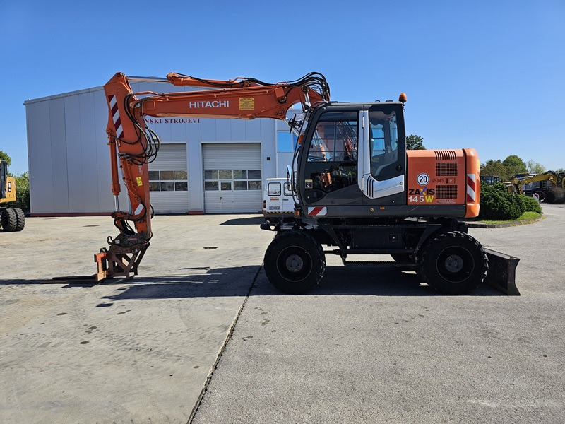 HITACHI ZX145W-3 - מחפר גלגלים: תמונה 1 HITACHI ZX145W-3 - מחפר גלגלים: תמונה 1