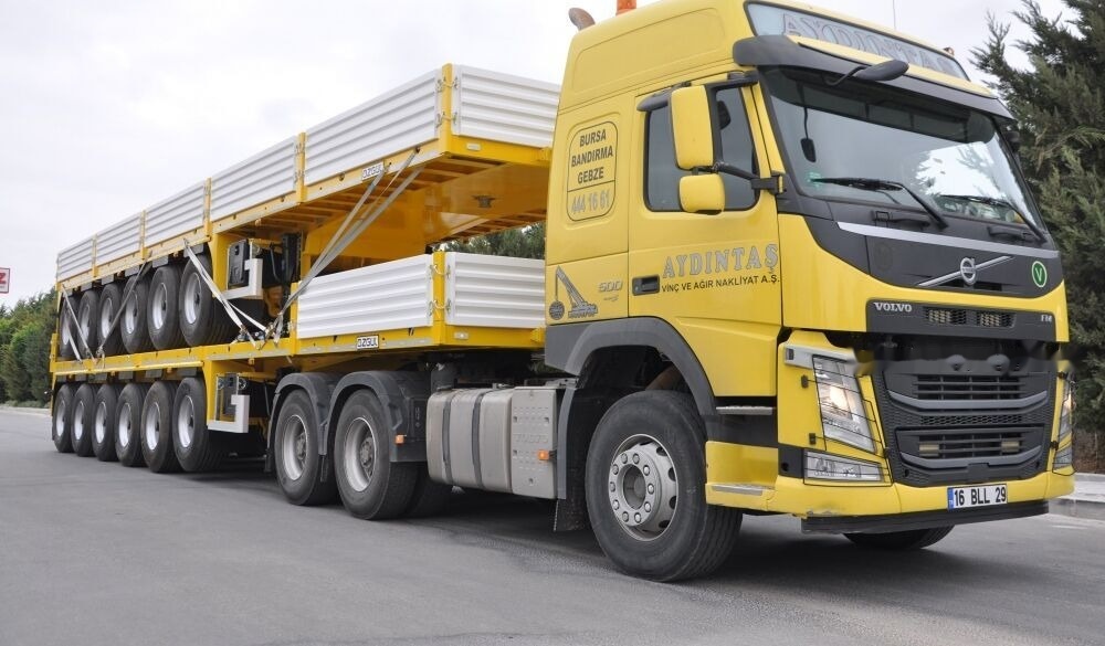 Özgül 6 AXLE PLATFORM SEMI TRAILER - סמיטריילר צד נופל/ שטוח: תמונה 1 Özgül 6 AXLE PLATFORM SEMI TRAILER - סמיטריילר צד נופל/ שטוח: תמונה 1