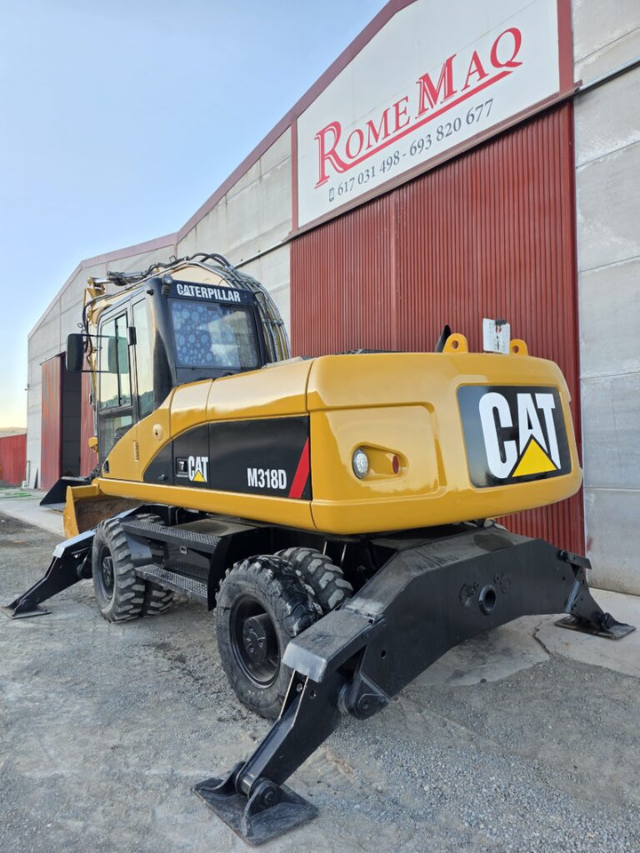 CAT M318D - מחפר גלגלים: תמונה 2 CAT M318D - מחפר גלגלים: תמונה 2