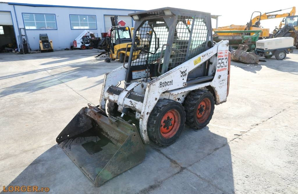 Bobcat 553 - מעמיס היגוי החלקה: תמונה 1 Bobcat 553 - מעמיס היגוי החלקה: תמונה 1