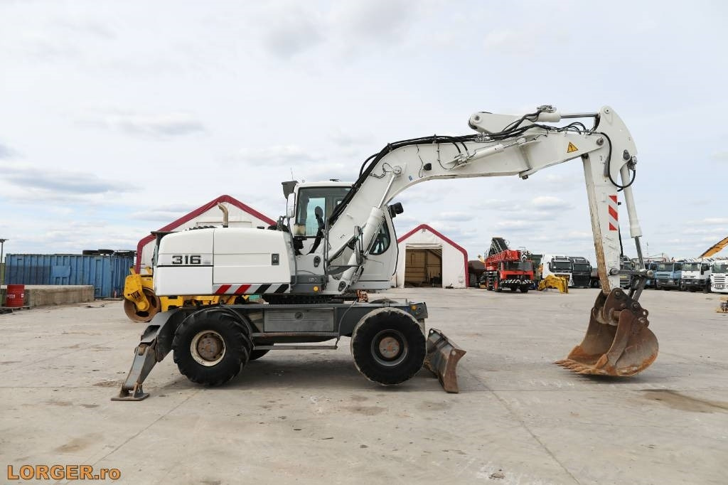 Liebherr A 316 Litronic - מחפר גלגלים: תמונה 1 Liebherr A 316 Litronic - מחפר גלגלים: תמונה 1