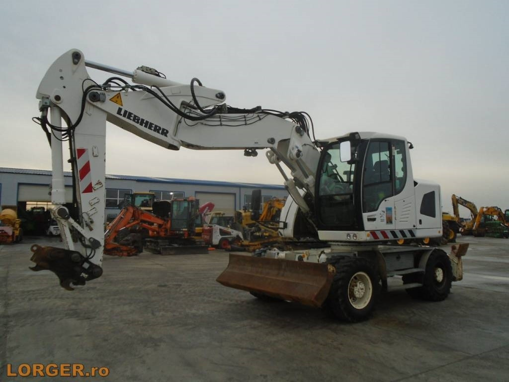 Liebherr A 918 Compact - מחפר גלגלים: תמונה 1 Liebherr A 918 Compact - מחפר גלגלים: תמונה 1