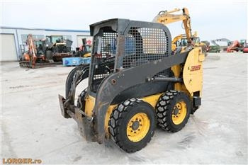 New Holland L 215 - מעמיס היגוי החלקה: תמונה 1 New Holland L 215 - מעמיס היגוי החלקה: תמונה 1