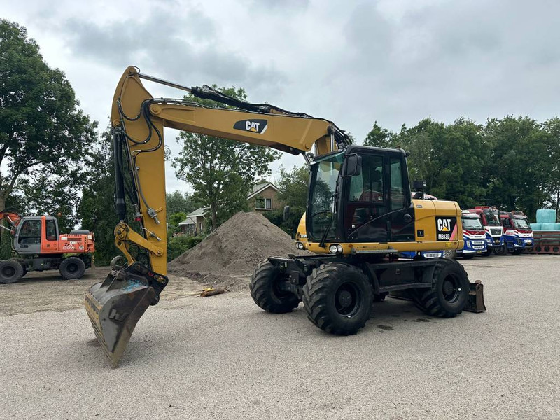 Cat M 313 D - מחפר גלגלים: תמונה 2 Cat M 313 D - מחפר גלגלים: תמונה 2