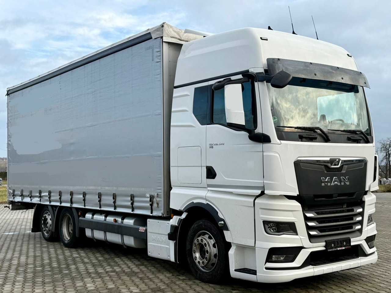 MAN TGX 26.470 / FIRANKA / 19 EUROPALET / XXL / NISKI PRZEBIEG / NOWY MODEL / 6X2 - משאית וילונות צד: תמונה 1 MAN TGX 26.470 / FIRANKA / 19 EUROPALET / XXL / NISKI PRZEBIEG / NOWY MODEL / 6X2 - משאית וילונות צד: תמונה 1