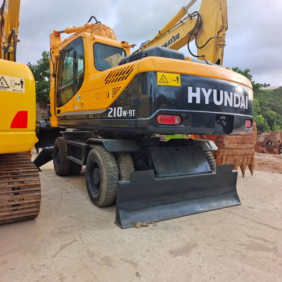 Hyundai 210W-9 - מחפר גלגלים: תמונה 1 Hyundai 210W-9 - מחפר גלגלים: תמונה 1
