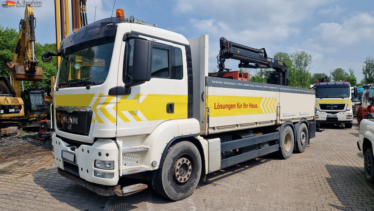 MAN TGS 26.400 PK 15001 Performance Zustand gut, Aufsitzkran - משאית מנוף, משאית צד נופל/ שטוחה: תמונה 1 MAN TGS 26.400 PK 15001 Performance Zustand gut, Aufsitzkran - משאית מנוף, משאית צד נופל/ שטוחה: תמונה 1